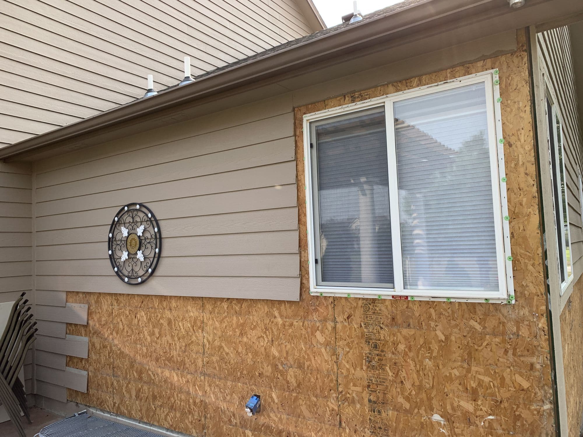 Window trim and siding repair detail, Windsor, Colorado