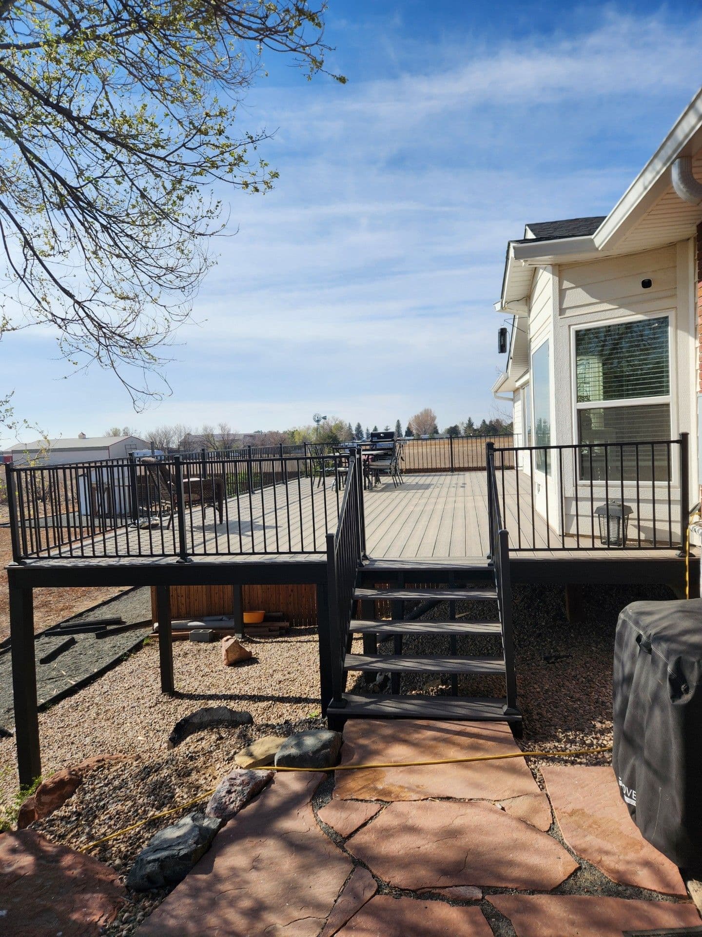 Composite deck with stairs down to the yard