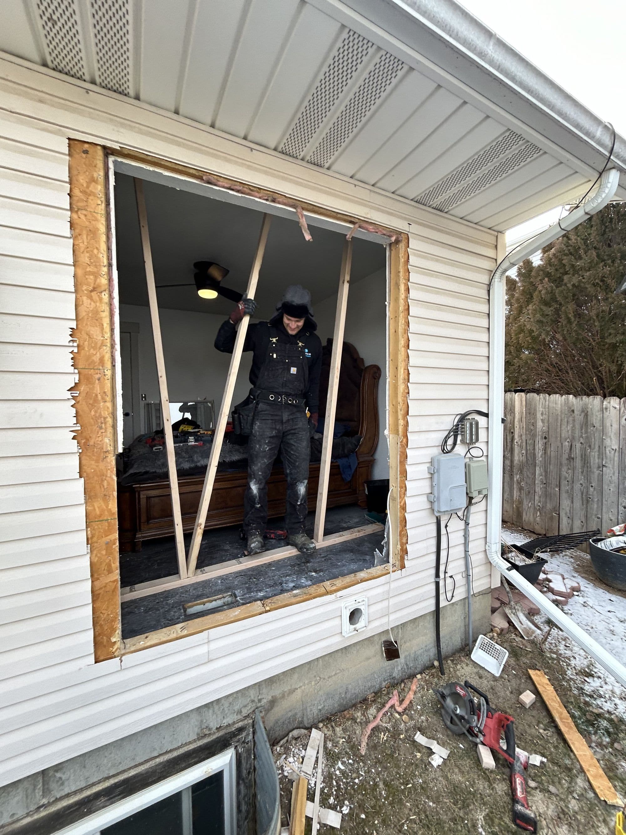 New French doors installed as part of a deck addition project