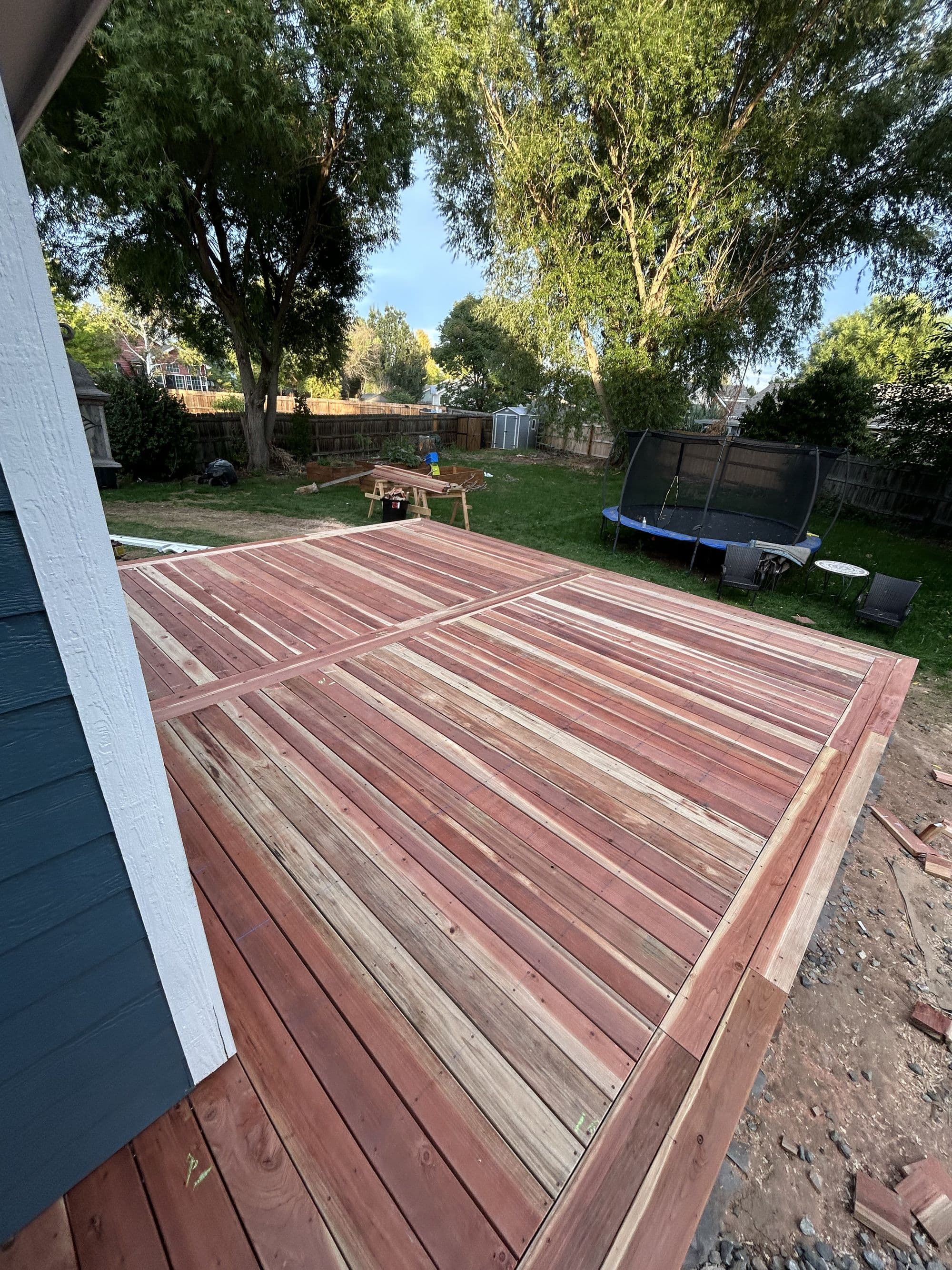 Decking installed, wide view of a large deck build