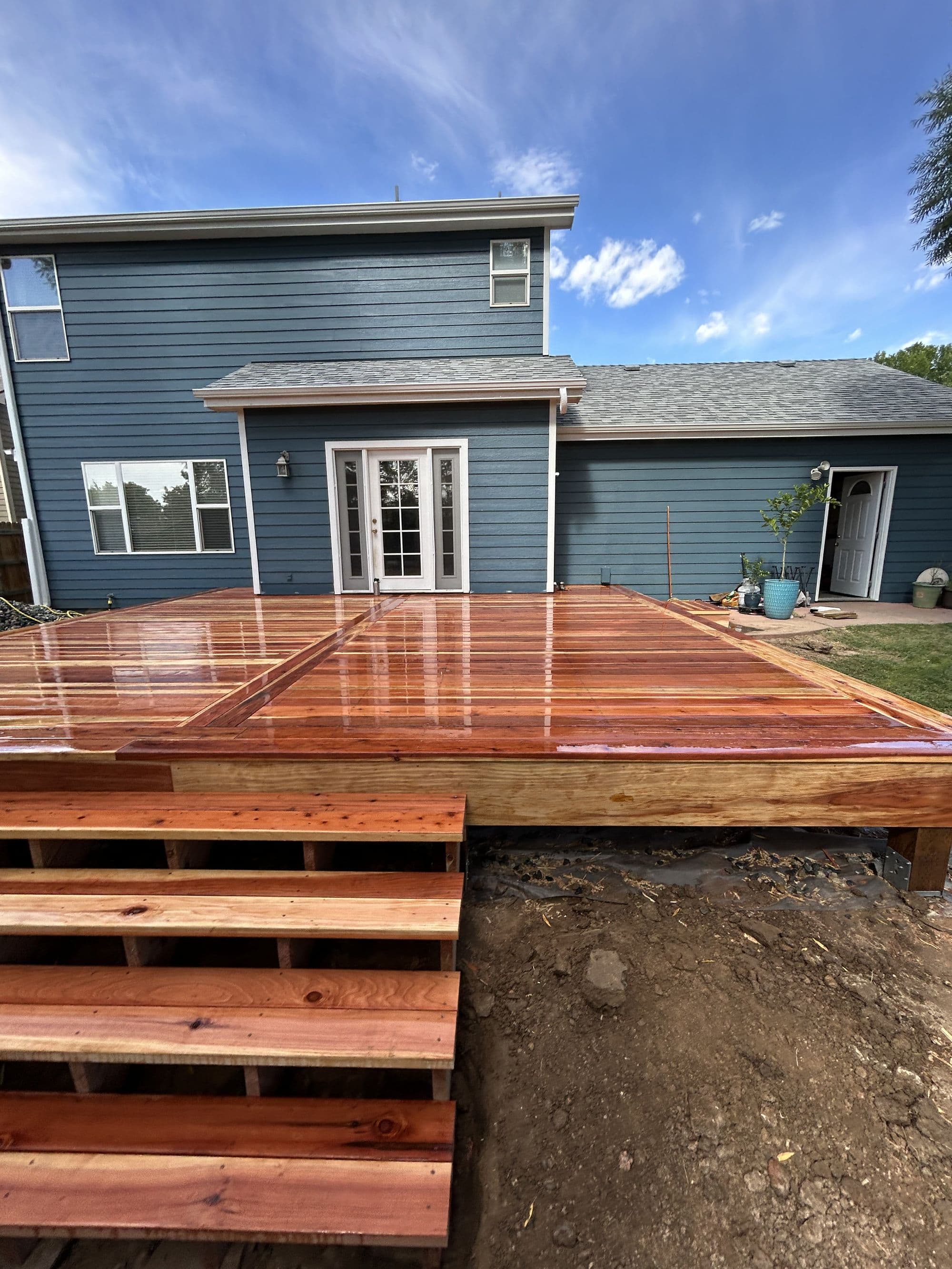 Finished large deck with stairs, wide hero view